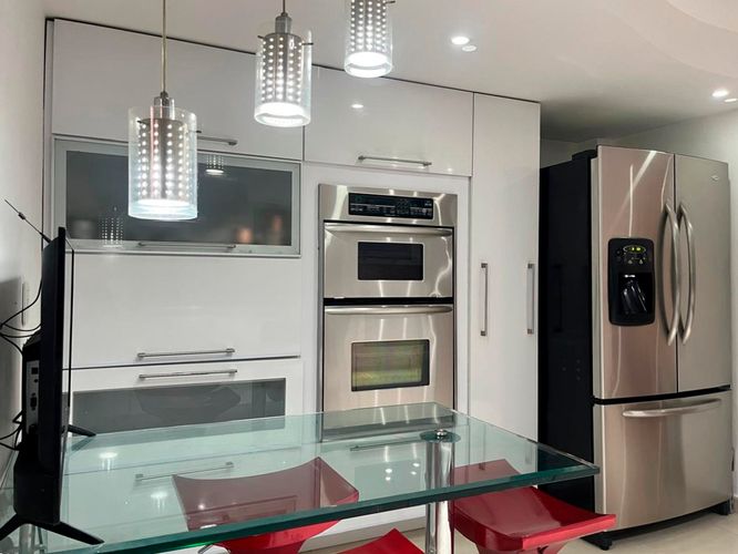 Casa de 4 alcobas en arriendo en El Poblado, Medellín, 400 m² · foto 10 de 18