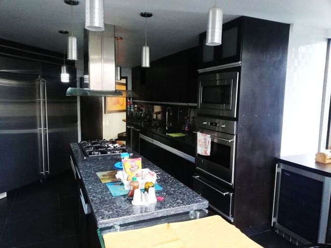 Apartamento de 4 alcobas en arriendo en El Poblado, Medellín, 520 m² · foto 5 de 14