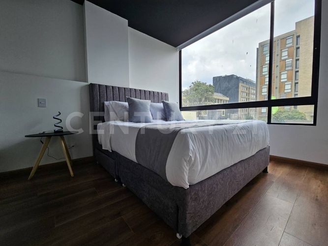 Apartamento de 1 alcoba en venta en Chico Norte, Bogotá, 49 m² · foto 8 de 21