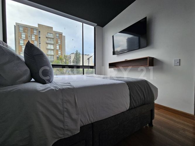 Apartamento de 1 alcoba en venta en Chico Norte, Bogotá, 49 m² · foto 9 de 21