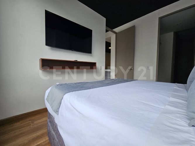 Apartamento de 1 alcoba en venta en Chico Norte, Bogotá, 49 m² · foto 10 de 21