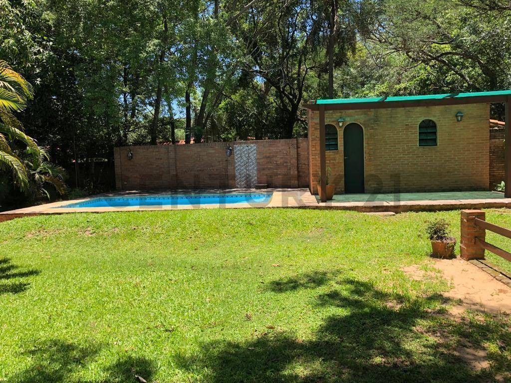 Exclusiva Casa en Venta en Urbanización SADI, San Bernardino, Cordillera - Terreno de 1.100m² con 190m² Construidos, 2 Dormitorios, 2 Baños, 3 Estacionamientos. Ubicación Privilegiada a 2 Cuadras de Avda. Guillermo Naumann y Cerca del Lago. ¡Oportunidad Ú — foto 2