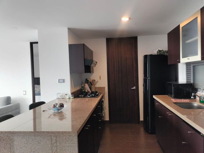 Apartamento de 2 alcobas en arriendo en El Poblado, Medellín, 97 m² · foto 5 de 15