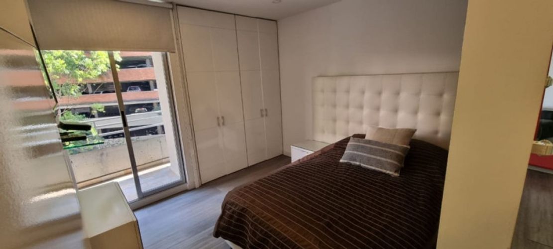 Apartamento de 3 alcobas en arriendo en Los Naranjos, Medellín, 130 m² · foto 11 de 16