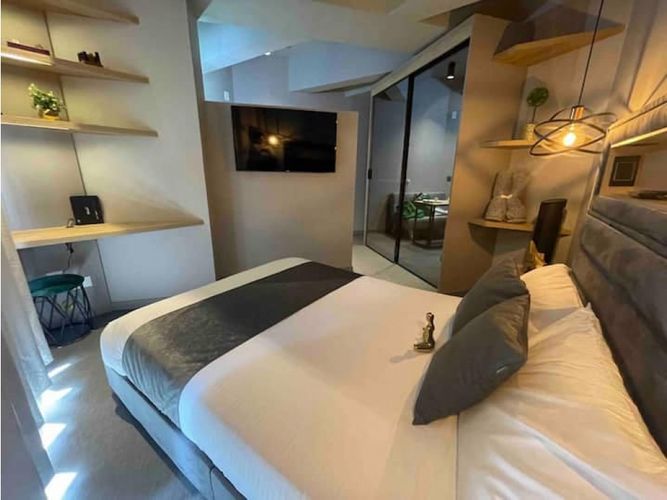 Apartaestudio en venta en Chico, Bogotá, 26 m² · foto 23 de 24