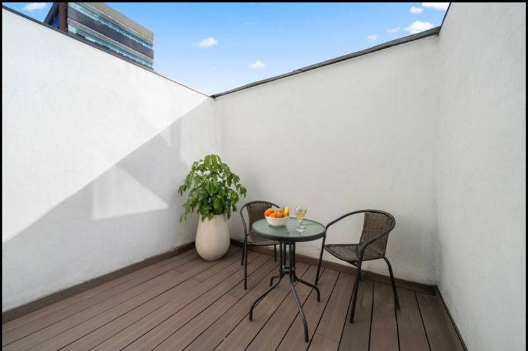 Apartaestudio en venta en Chico Norte, Bogotá, 24 m² · foto 8 de 15