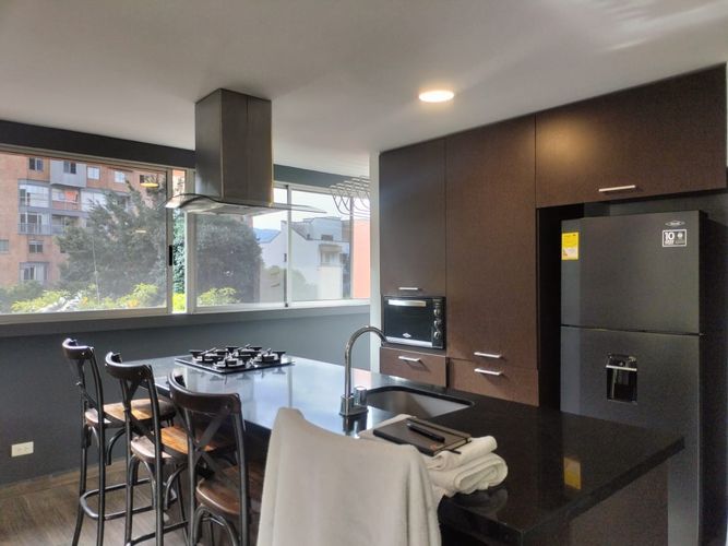 Apartamento de 2 alcobas en arriendo en El Poblado, Medellín, 99 m² · foto 6 de 16