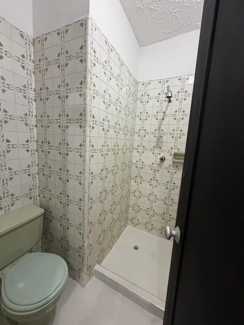Casa de 5 alcobas en venta en Departamental, Cali · foto 11 de 15