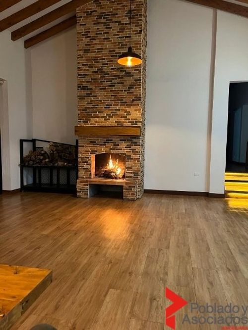 Casa de 4 alcobas en arriendo en Santa Elena, Medellín, 30 m² · foto 4 de 17