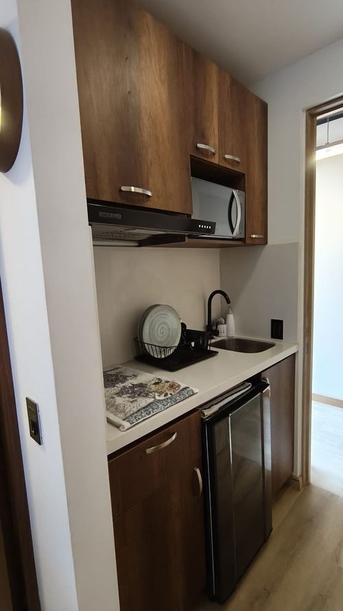 Apartamento de 1 alcoba en venta en Chico, Bogotá, 18 m² · foto 7 de 12