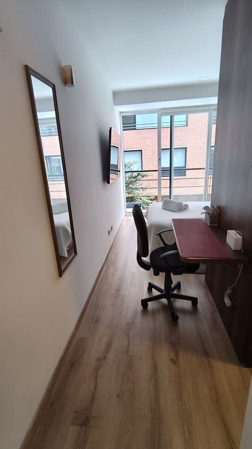 Apartamento de 1 alcoba en venta en Chico, Bogotá, 18 m² · foto 2 de 12