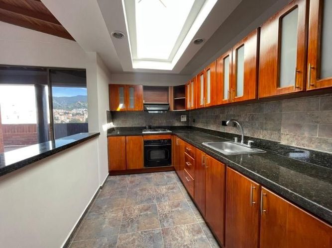 Apartamento de 4 alcobas en arriendo en Laureles, Medellín · foto 4 de 18