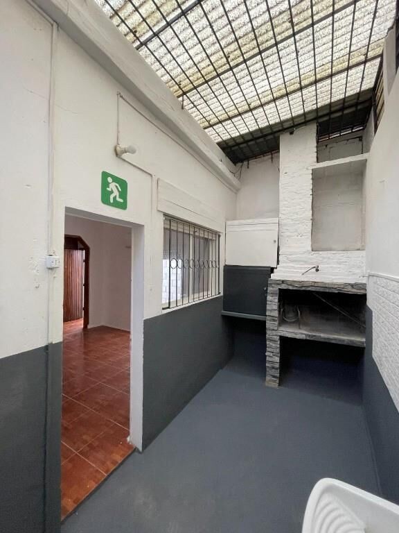 1 dormitorio tipo casita en Pocitos | Estufa a leña y parrillero, Sin GC · Foto 11