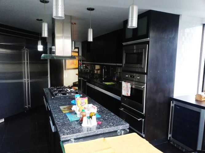 Apartamento de 4 alcobas en arriendo en El Poblado, Medellín, 520 m² · foto 6 de 14