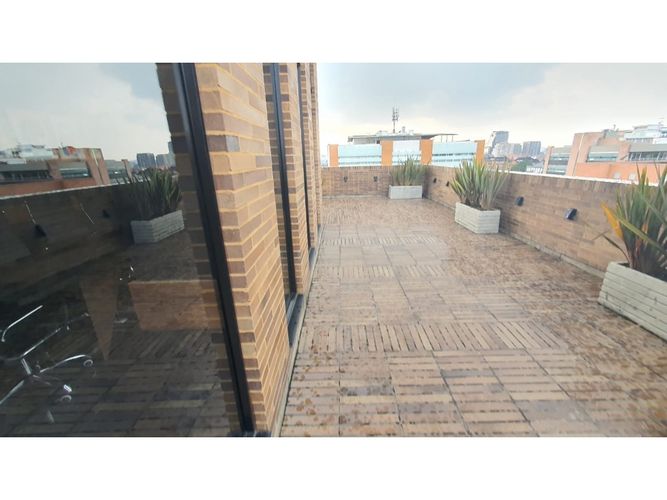 Apartaestudio en venta en Chico Norte, Bogotá, 33 m² · foto 16 de 19