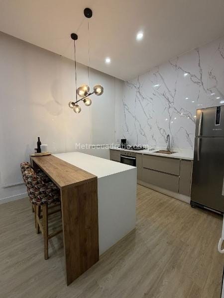 Apartamento de 1 alcoba en venta en San Patricio, Bogotá, 62 m² · foto 2 de 13