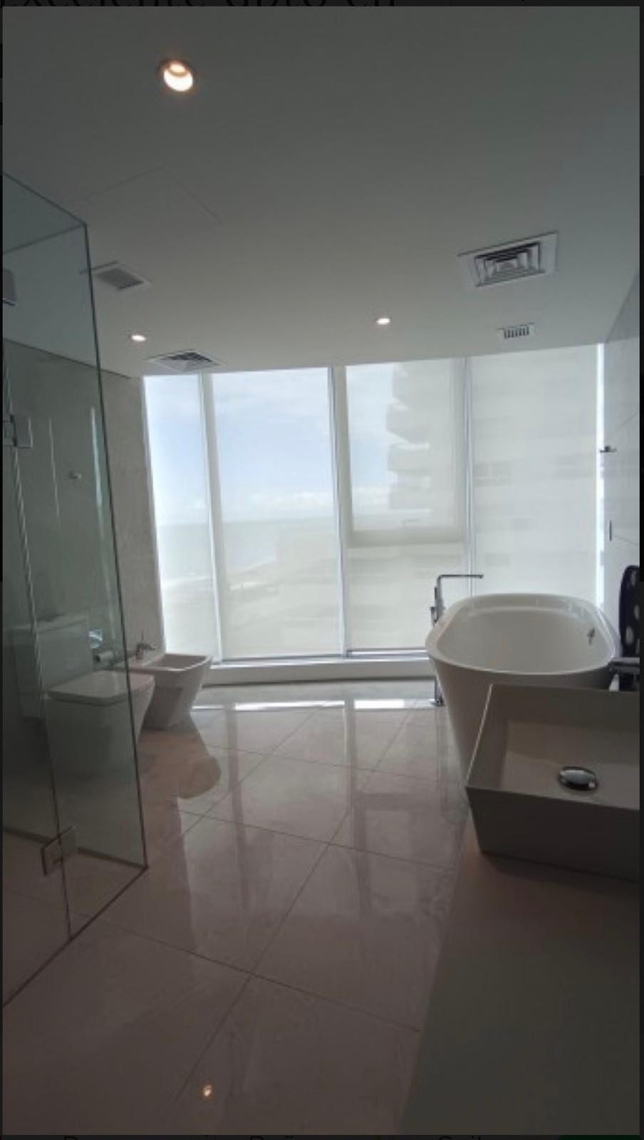 Alquiler ANUAL Exclusivo: Apartamento Moderno con Vistas Panorámicas en Trump Tower Punta del Este. (Unidad Compartida 2 inmob.). Unidad 1203 · Foto 8