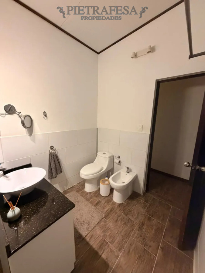 Casa en alquiler, 2 dormitorios, 1 baño, patio, barbacoa, cochera. Solymar. · Foto 11