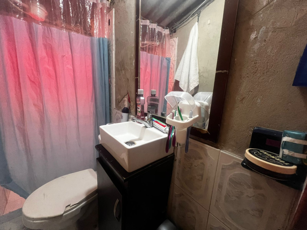 Casa en venta en El Carmen, Bogotá · foto 6 de 18