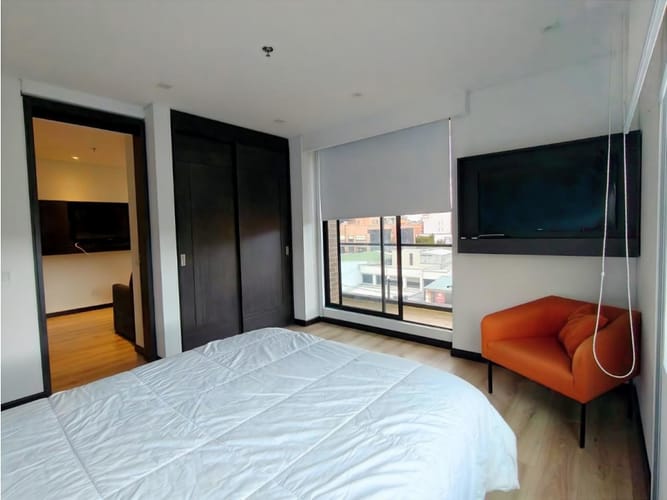 Apartaestudio en venta en Chicó Navarra, Bogotá, 55 m² · foto 18 de 24