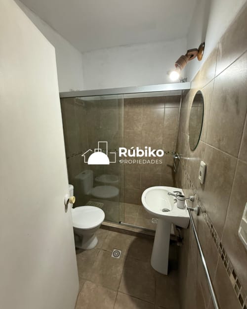 Apartamendo de Dos Dormitorios, Estufa a leña y Terraza con Parrillero. · Foto 8
