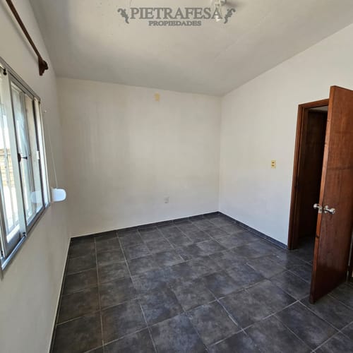 Casa en alquiler, 2 dormitorios, 1 baño, patio con parrillero, cochera. Carrasco Norte. · Foto 7
