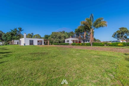 Venta de campo 3,5Ha. sobre Ruta 87 con dos casas.