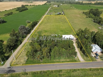EN VENTA CHACRA DE 14.700M2 CON 2 CASAS, UBICADA SOBRE CAMINO DEL MEDIO, UNA DE LAS ZONAS MAS COTIZADAS DE COLONIA DEL SACRAMENTO