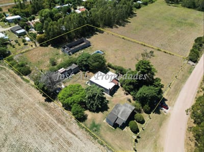 EN VENTA CHACRA UBICADA EN RIACHUELO A METROS DE RUTA Nº1, CON 2 CONSTRUCCIONES Y 7092M2 DE TERRENO, COLONIA.