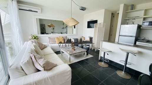 Venta departamento en Manantiales 2 dormitorios con patio y garaje