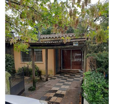 Venta Casa con Apartamento al Fondo en Barros Blancos