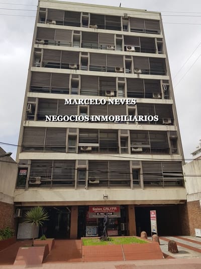 FRENTE AL EDIFICIO NOTARIADO