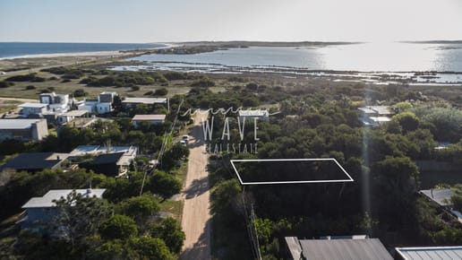 Venta Lote La Juanita Vista Parcial laguna y mar