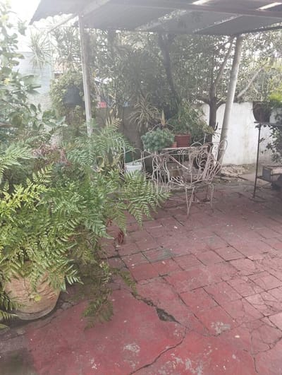 En venta en La Teja terreno con mejoras