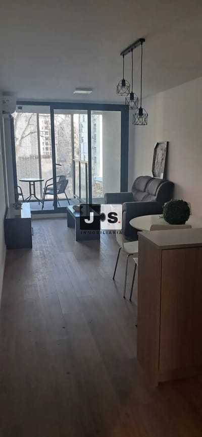 Alquilo apartamento 2 dormitorios c/garage barrio Cordon