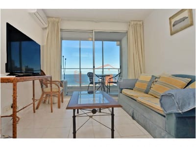 Piso alto con vista al mar, 2 dorm, 2 baños, garaje. Todos los servicios