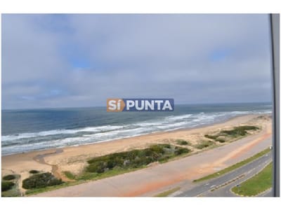 Primera línea en playa brava
