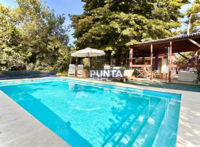 Casa de 7 dormitorios con piscina climatizada en alquiler verano Punta del Este