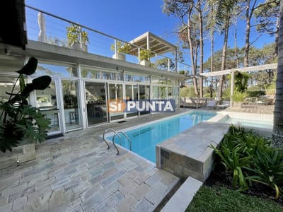 Casa en alquiler 4 dormitorios piscina climatizada