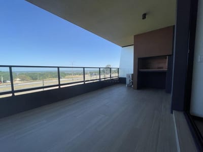 Venta con RENTA frente al mar con una terraza única con parrillero