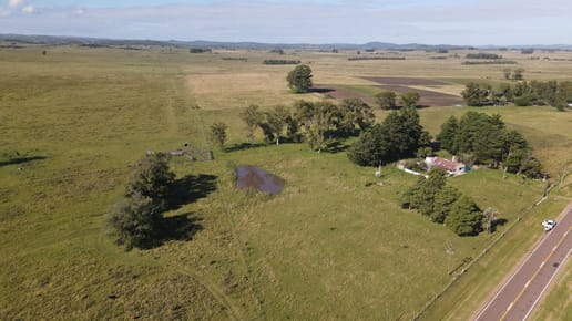 Chacra8ha  con Casa sobre ruta 13
