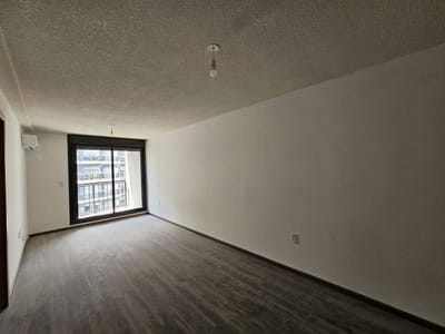 -Apartamento de dos dormitorios con balcon y cocina definida en Cordon.