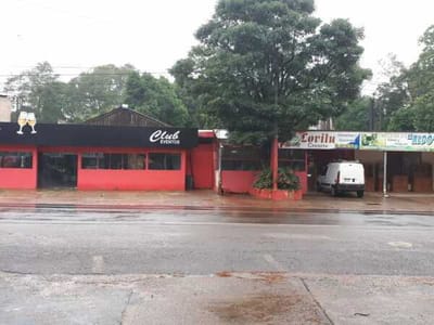 BAJÓ DE PRECIO !!!  Terreno con Salón (Frente a frutería Paraguarí)