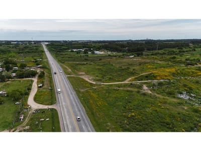 VENDE TERRENO DE 30.781  M2 SOBRE RUTA 102