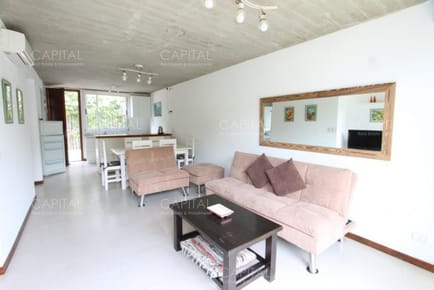 Mananatiales departamento 2 dormitorios con jardín y parrillero