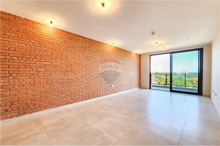 En venta departamento con renta en edificio Spoterra - Los Laureles, Asunción