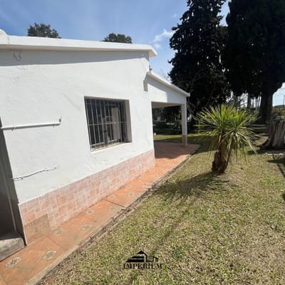 VENTA | Casa en Canelones con Amplio Jardín y Chimenea   US$ 155.000
