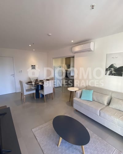 VENTA DEPARTAMENTO AMOBLADO DOS DORMITORIOS. CON RENTA, ZONA SHOPPING SOL Y MOLAS LÓPEZ. INCLUYE COCHERA

