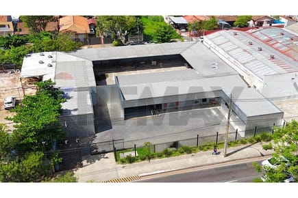 Alquiler Corporativo Premium -  Asunción, Paraguay - 7,250 $ Mensual. Exclusivo Depósito Corporativo sobre Av. Madame Lynch: Ubicación Estratégica, Operación Eficiente e Imagen Sólida. Este inmueble corporativo ofrece una combinación inigualable: alta vis