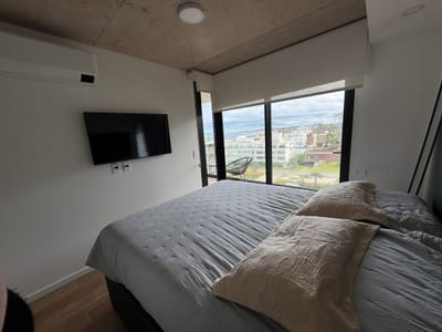 Apartamento de 1 dormitorio con mueble y  garaje